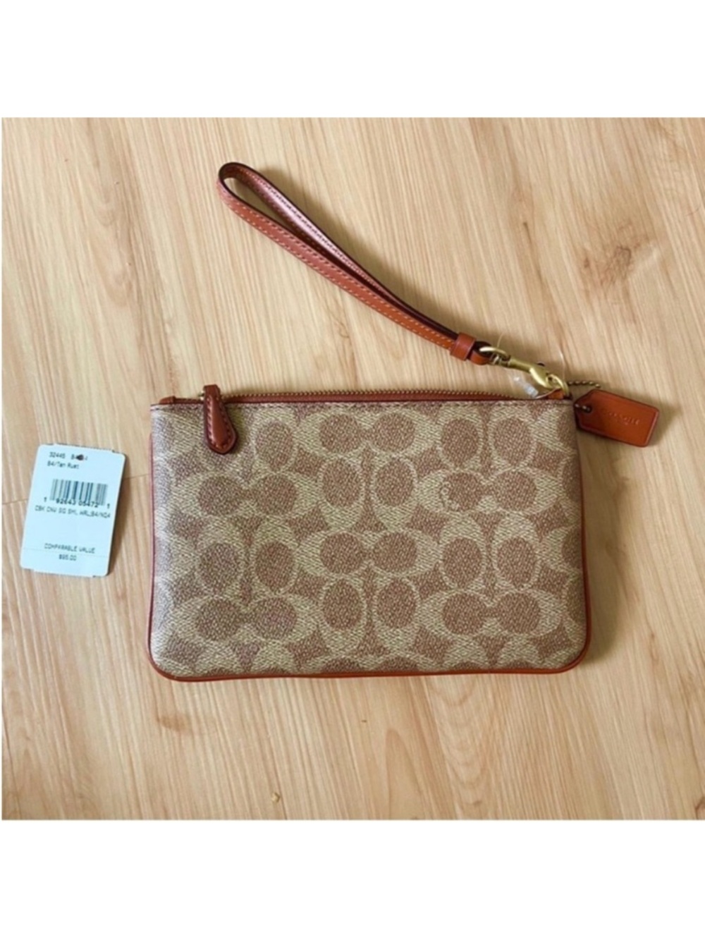 Coach Brass/Tan/Rust Small
Wristlet In Colorblock
Signature Canvas #32445 - Picture 2 of 5